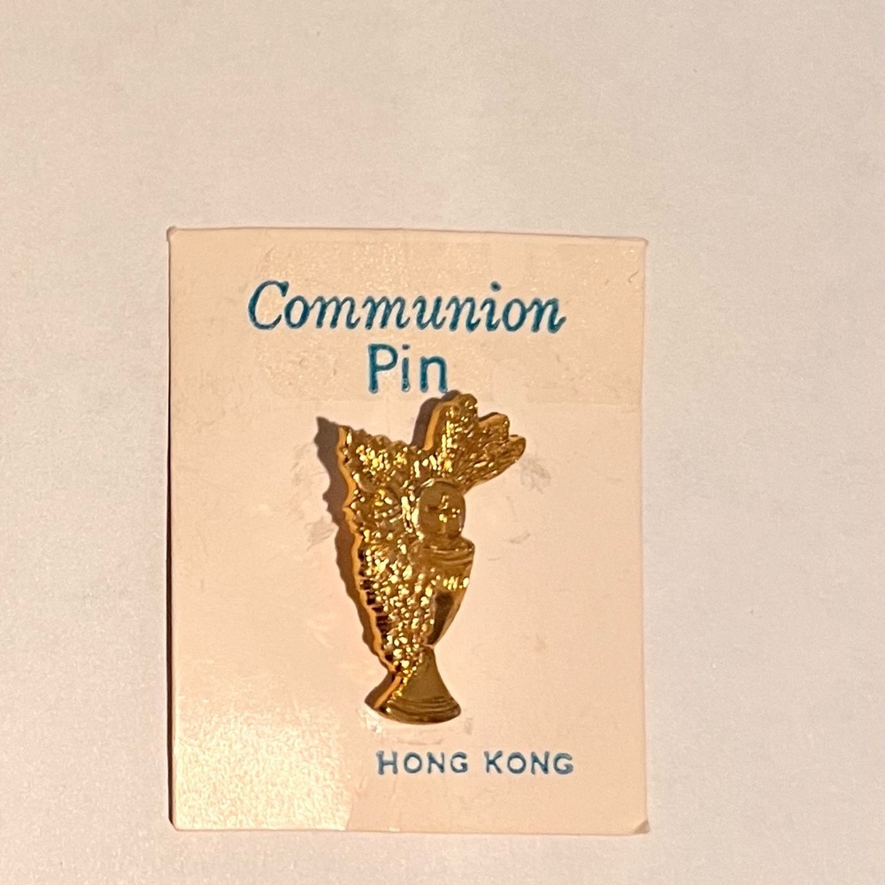 vintage gold-tone First Communion lapel pin.
